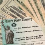 Iran Receives BILLIONS – Deal Details LEAKED! U.S. Treasury check on top of scattered dollar bills