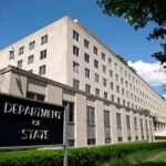 Trump Removes Muslim Nation From Terror Watchlist Department of State building exterior on a sunny day