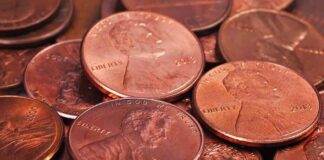 pile of copper pennies with heads side up