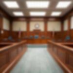 Austin Metcalf’s Grieving Family LABLED ‘White Supremacists’ Empty courtroom with wooden benches and judge's bench