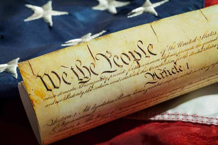 United States Constitution scroll on an American flag