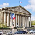 Convicted Right Wing Leader SURGES Ahead In Election Neoclassical building with columns and French flags