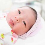 Trump Brings Back Citizenship Fight Using Unknown LOOPHOLE newborn baby lying on a blanket