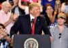 Donald Trump at a podium during a rally