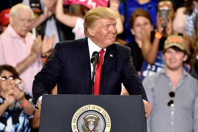 Donald Trump at a podium during a rally