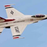 USAF fighter jet in flight against clear sky
