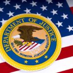 DOJ Strips Citizenship in Largest Denaturalization Effort in History Department of Justice seal on American flag background