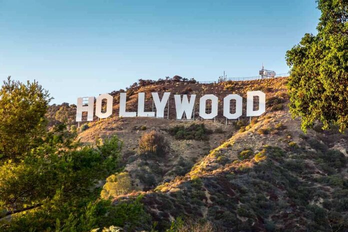shutterstock_114467512 Hollywood Sign on a sunlit hillside