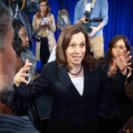 Kamala Maniacally Laughs During Dem Campaign Event Kamala Harris speaks to a crowd as Maya Harris stands nearby