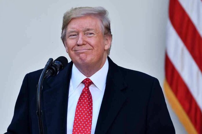 Donald Trump at a podium with a microphone