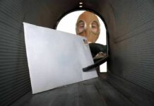 White Powder Panic Freezes Congress! Letter inside a mailbox with a person wearing a gas mask outside