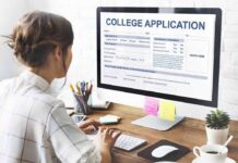 DOJ Sues University for Putting ‘Illegal Aliens Over U.S. Citizens’ Student completing a college application on a desktop computer