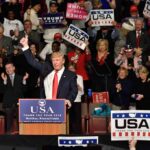 Trump Insults Rally Crowd in the WORST Possible Way Donald Trump addresses a rally crowd at a podium, raising his fist