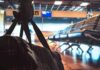 FBI Nabs Alleged China Spy At LAX duffel bag in foreground at empty airport gate seating