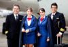 Drunk Woman Caught on Flight Touching Herself Airline crew standing together on the tarmac
