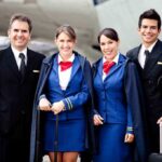 Drunk Woman Caught on Flight Touching Herself Airline crew standing together on the tarmac